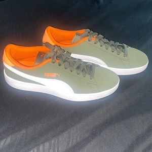 Green & orange puma shoes